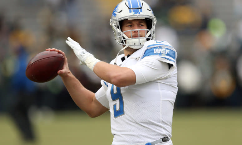 Detroit Lions QB Matthew Stafford throwing the football in warmups.