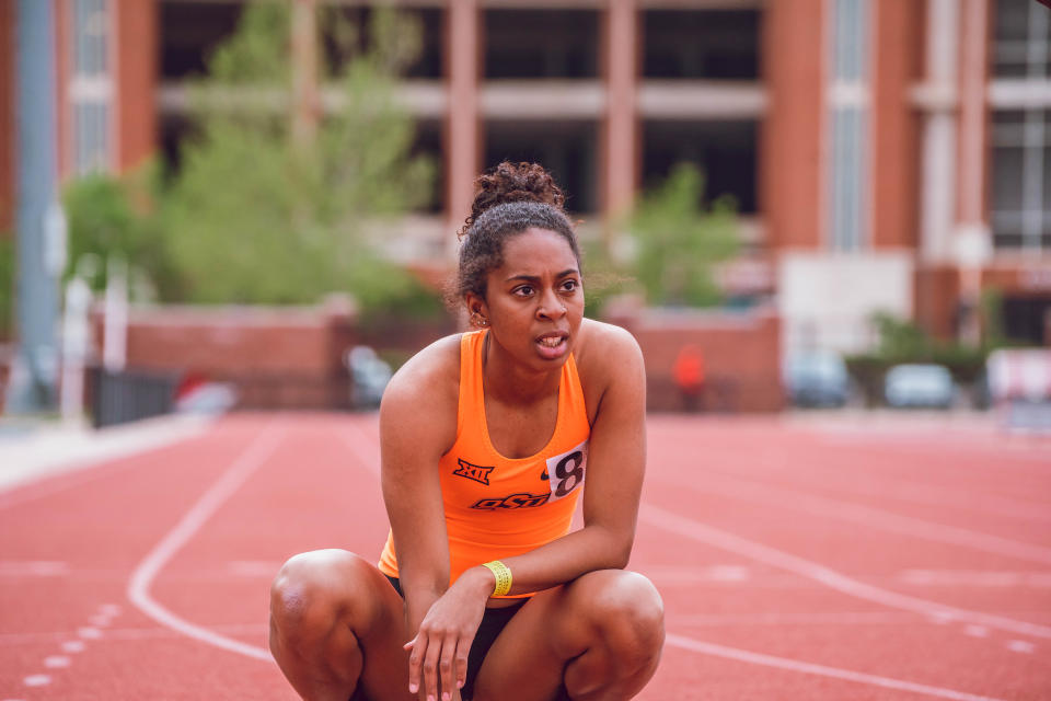 Oklahoma State long jumper and relay runner Sanye Ford prepares for a race.
