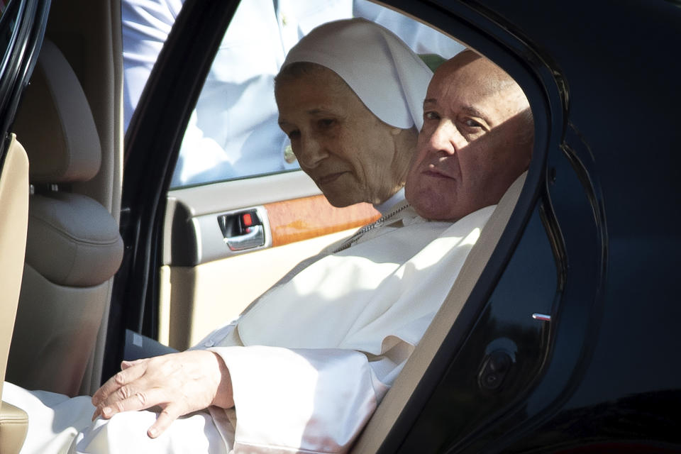 Pope Francis and his cousin Ana Rosa Sivori arrive for a welcome ceremony at the government house in Bangkok, Thailand, Thursday, Nov. 21, 2019. Pope Francis is on a four-day visit to Thailand. (AP Photo/Wason Wanichakorn)