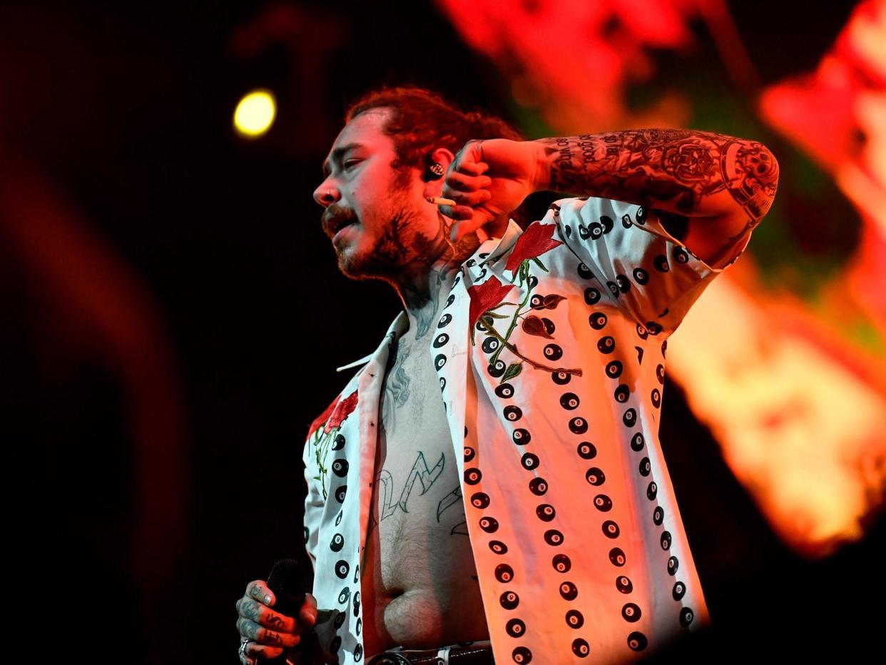 Rapper/singer Post Malone performs onstage at Coachella festival, 21 April 2018: Getty