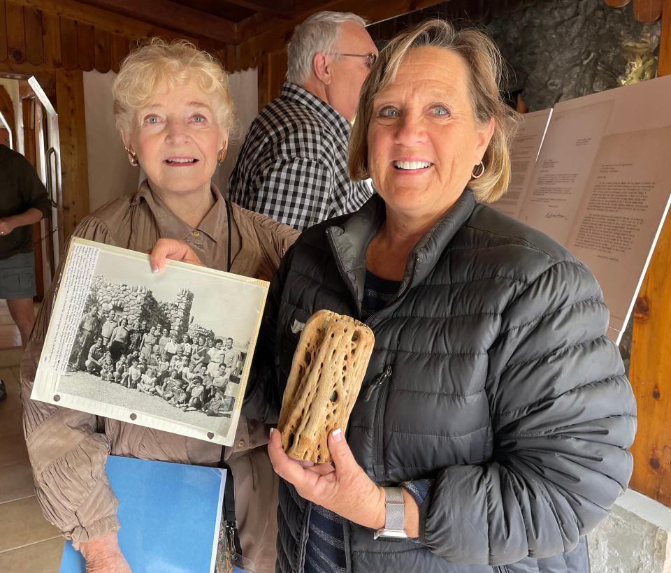 Marjorie Snell of the Desert Hot Springs Historical Society takes a photo with Lori Bachelder-Nelson, whose great-grandmother was Leonora Watkins, at the Historic Rock House on Saturday, Jan. 20, 2024. Bachelder-Nelson holds family memorabilia.