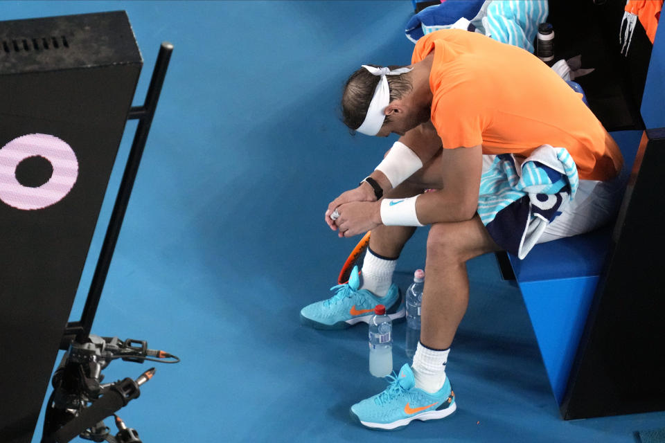 Rafael Nadal of Spain reacts during his second round match against Mackenzie McDonald of the U.S. at the Australian Open tennis championship in Melbourne, Australia, Wednesday, Jan. 18, 2023. (AP Photo/Dita Alangkara)