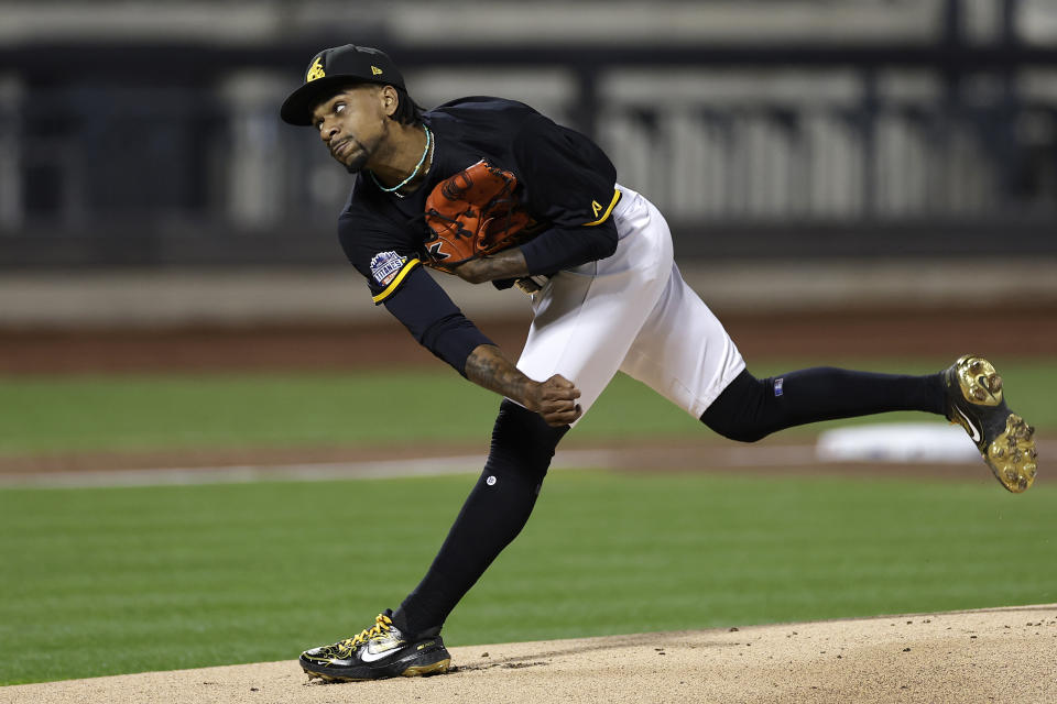 Águilas Cibaeñas' Ronnie Williams throws to a Los Tigres del Licey batter during the first inning of a Dominican League baseball game Friday, Nov. 10, 2023, in New York. (AP Photo/Adam Hunger)