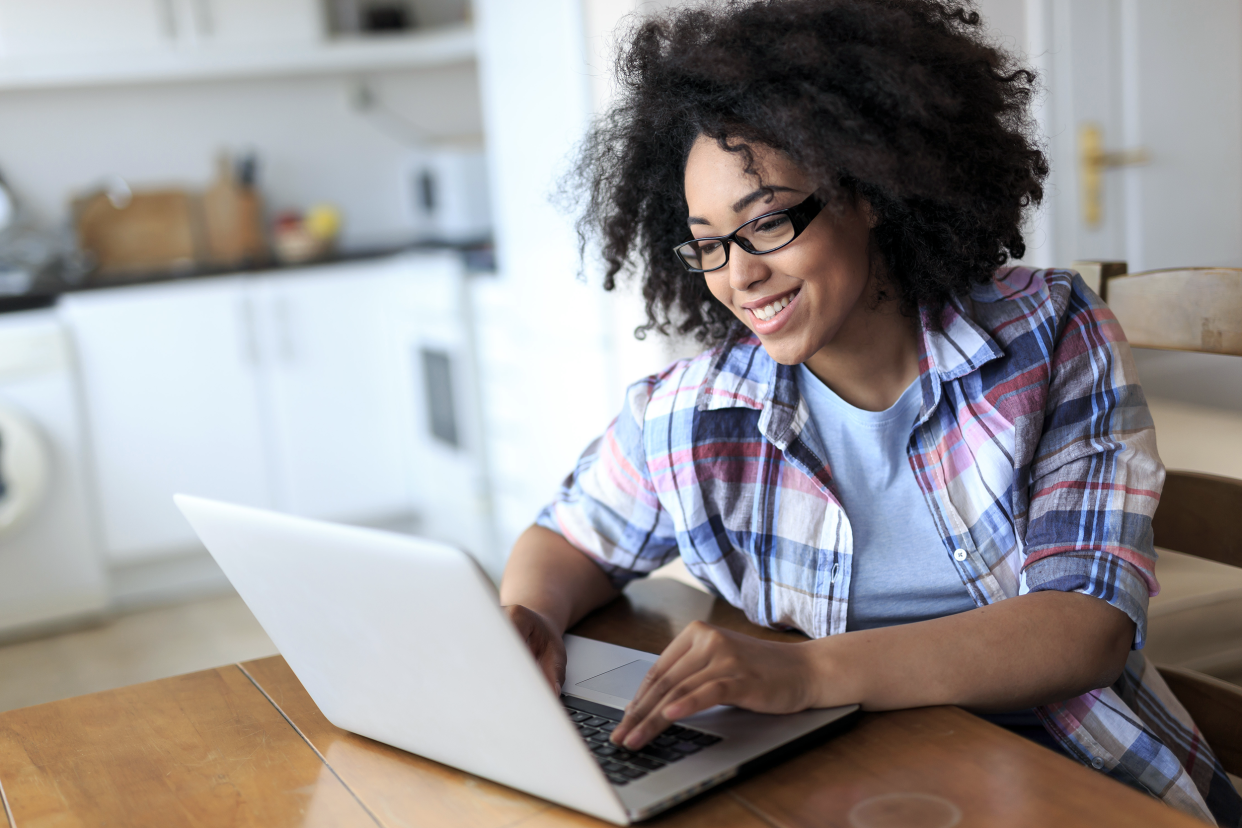 Woman on her laptop at home