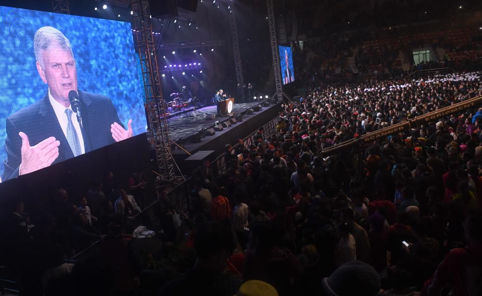 Graham speaks at a Christian evangelical gathering in Hanoi, Vietnam, on Dec. 9, 2017. (Photo: HOANG DINH NAM via Getty Images)