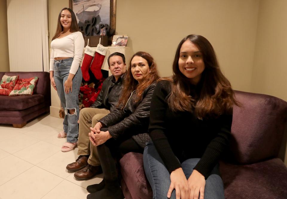 Carlos Salas and Gloria Verduzco and their daughters Ilianna, left, and Paulina, at their home in West Covina.