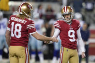 San Francisco 49ers place kicker Robbie Gould (9) is congratulated by Mitch Wishnowsky after kicking a field goal during the second half of an NFL divisional round playoff football game against the Dallas Cowboys in Santa Clara, Calif., Sunday, Jan. 22, 2023. (AP Photo/Tony Avelar)