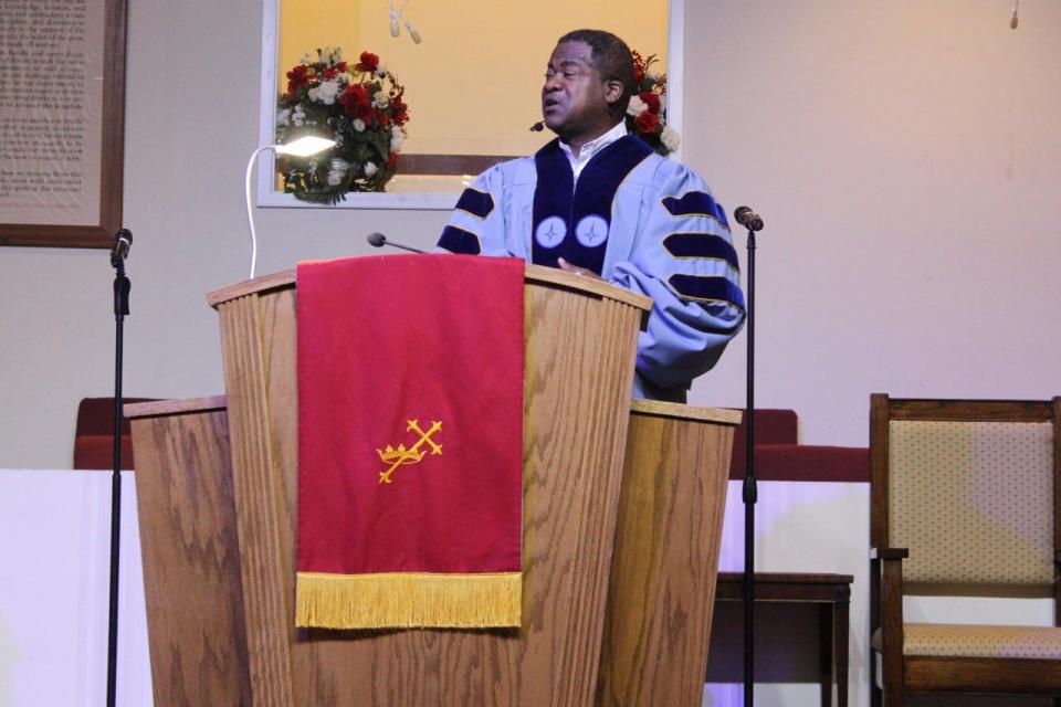 The Rev. Dr. Tyrone Blue, pastor of First Missionary Baptist Church, delivers the sermon Sunday at the church during a service celebrating National Children's Day.