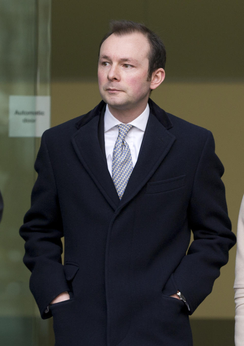 Former Barclays Bank employee Jonathan James Mathew leaves Westminster Magistrates court after appearing on charges of conspiracy to defraud in relation to the manipulation of the dollar Libor rate in London, Wednesday, Feb. 26, 2014. (AP Photo/Alastair Grant)