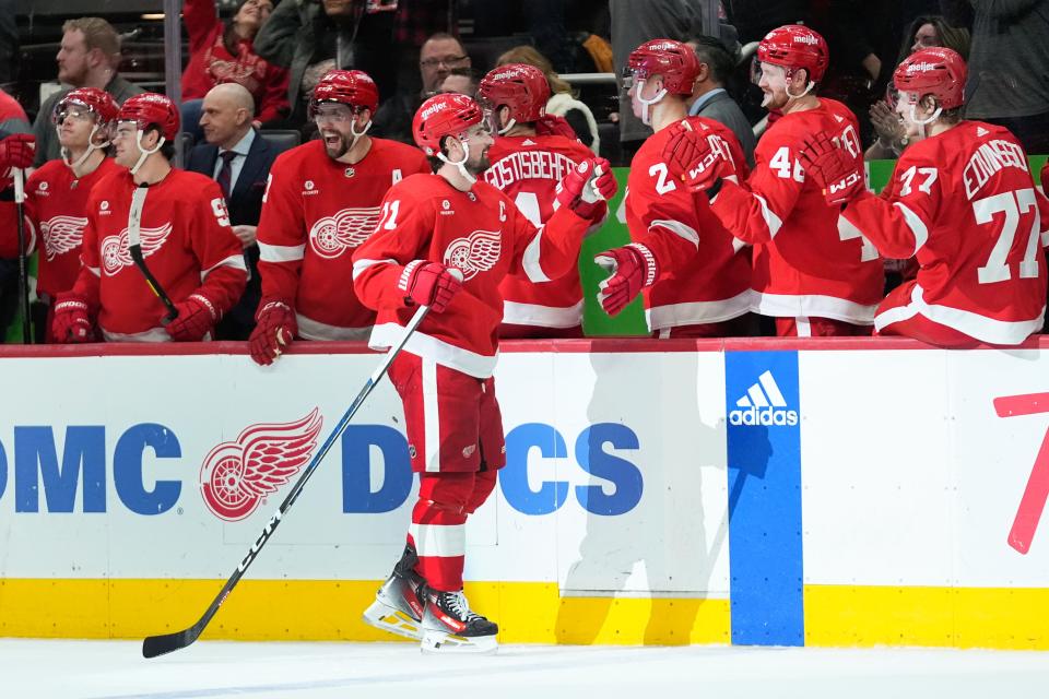 Detroit Red Wings center Dylan Larkin (71) celebrates his empty net goal against the New York Islanders in the third period at Little Caesars Arena on Thursday, March 21, 2024, in Detroit, Michigan.