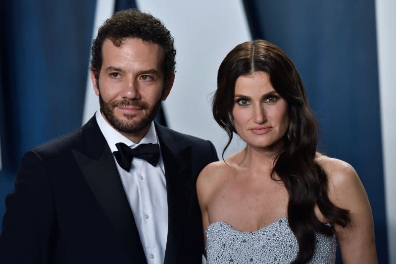 Idina Menzel (R) and Aaron Lohr attend the Vanity Fair Oscar party in 2020. File Photo by Chris Chew/UPI