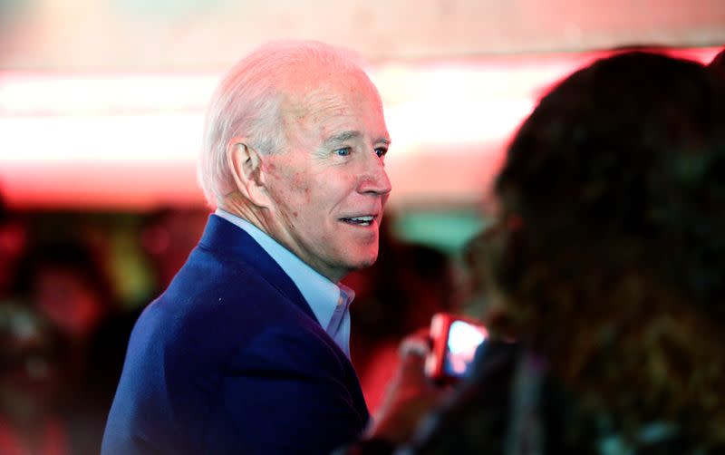 U.S. Democratic presidential candidate and former Vice President Biden talks with customers as he campaigns before his evening rally on Super Tuesday in Los Angeles