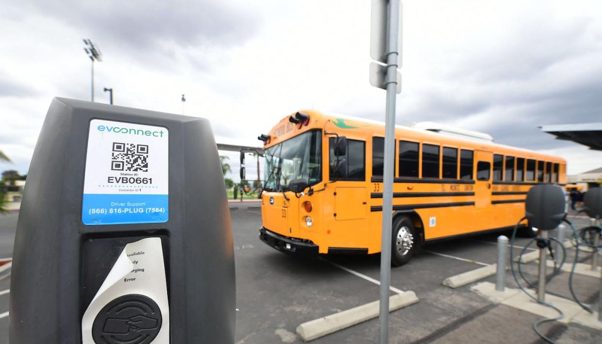 A new EV schoolbus from an all-electric fleet parked beside charging stations at South El Monte High School in California, Aug. 18, 2021. <a href="https://www.gettyimages.com/detail/news-photo/new-ev-schoolbus-from-an-all-electric-fleet-is-parked-news-photo/1234752434" rel="nofollow noopener" target="_blank" data-ylk="slk:Frederic J. Brown/AFP via Getty Images;elm:context_link;itc:0;sec:content-canvas" class="link ">Frederic J. Brown/AFP via Getty Images</a>