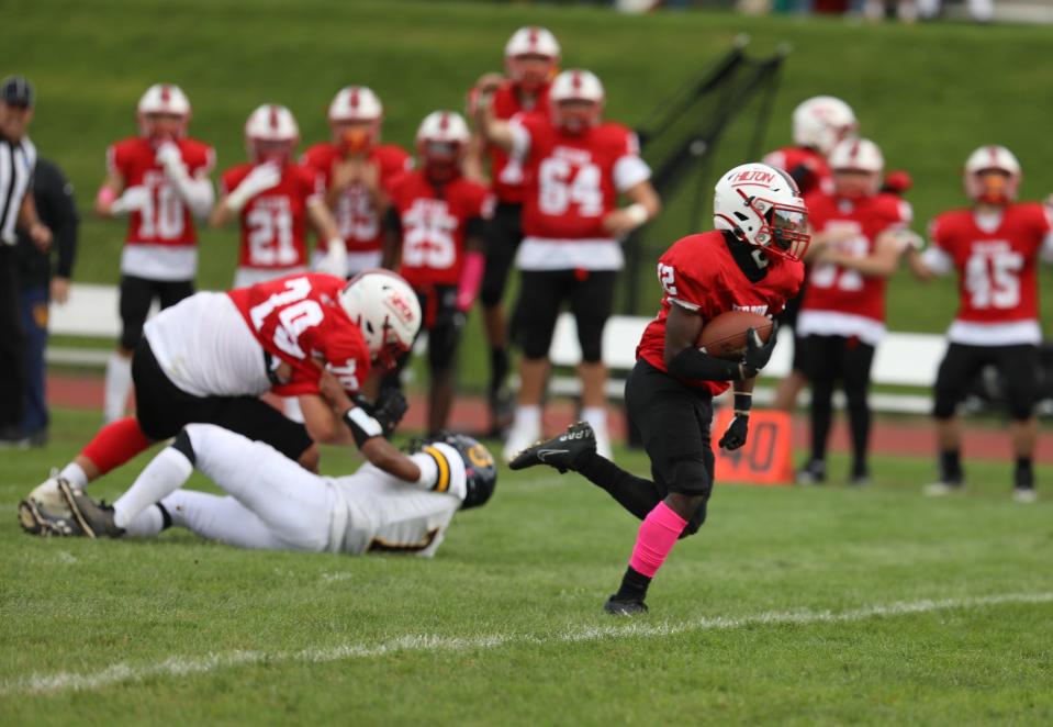 Hilton's Robert Lowry scores on a long touchdown run in the first half at Spencerport High School in Spencerport, NY on Oct. 1, 2022.