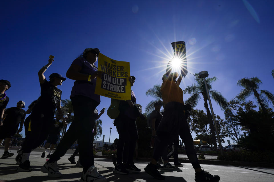 Kaiser Permanent workers picket Thursday, Oct. 5, 2023, in Baldwin Park, Calif. Some 75,000 Kaiser Permanente hospital employees who say understaffing is hurting patient care walked off the job in five states and the District of Columbia, kicking off a major health care worker strike.(AP Photo/Ryan Sun)