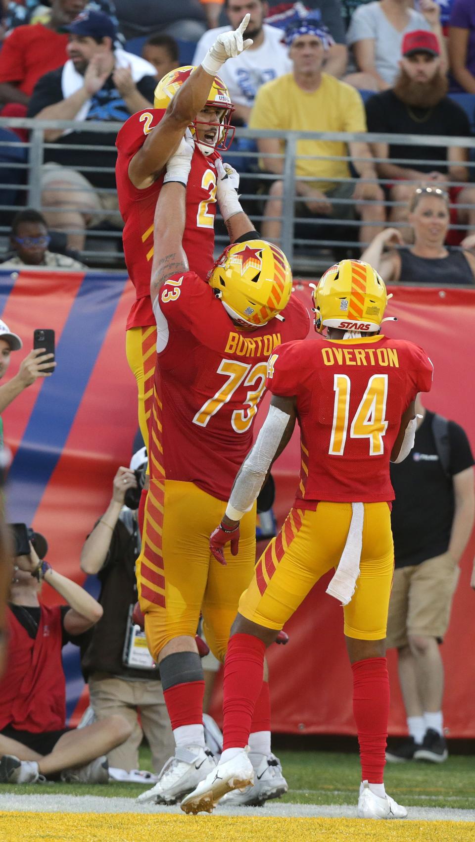 Philadelphia Stars receiver Jordan Suell is hosted up by teammate Jacob Burton after a first half touchdown against the Birmingham Stallions at Tom Benson Hall of Fame Stadium Sunday. July, 3, 2022.