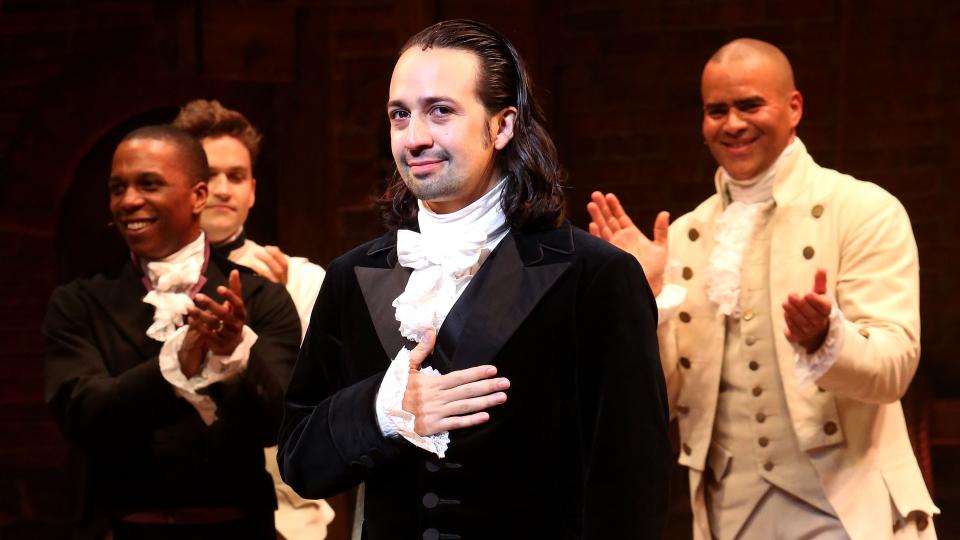 Hamilton creator Lin-Manuel Miranda takes the applause in the Hamilton stage play.