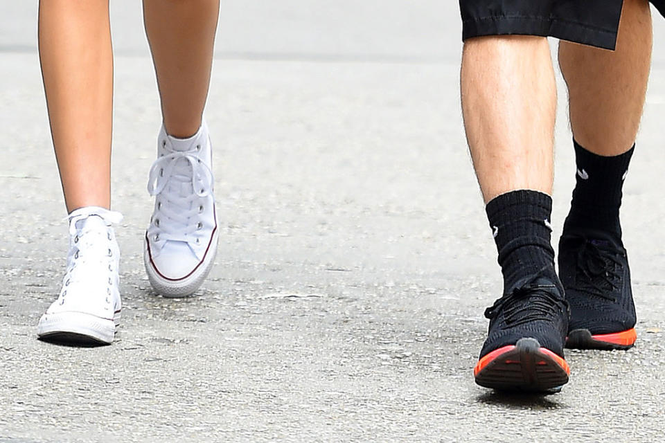 Kaia Gerber (L) and Tommy Dorfman’s shoes. - Credit: Splash News