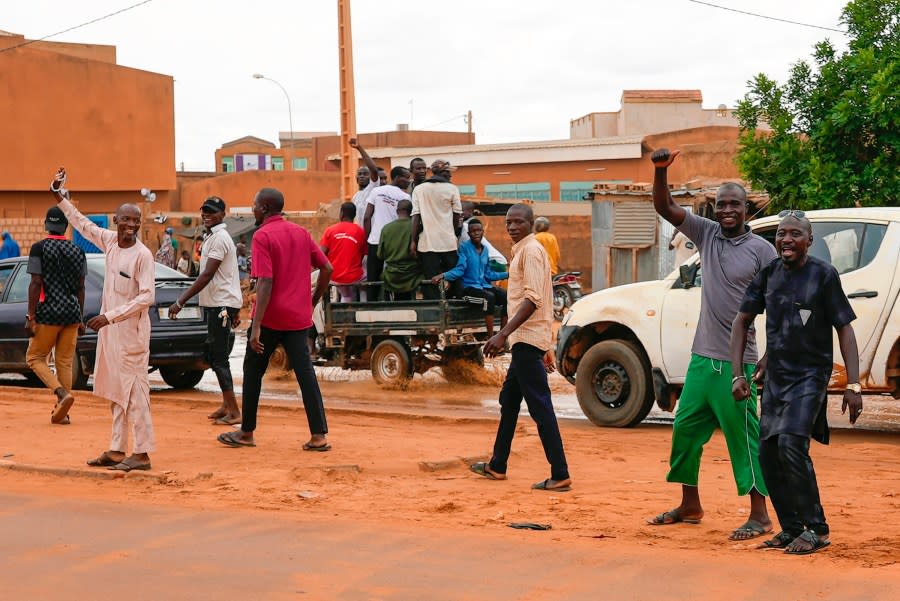 Nigerien men gather for an anti-French protest in Niamey, Niger, Friday, Aug. 11, 2023.The ECOWAS bloc said it had directed a “standby force” to restore constitutional order in Niger after its deadline to reinstate ousted President Mohamed Bazoum expired. (AP Photo/Sam Mednick)