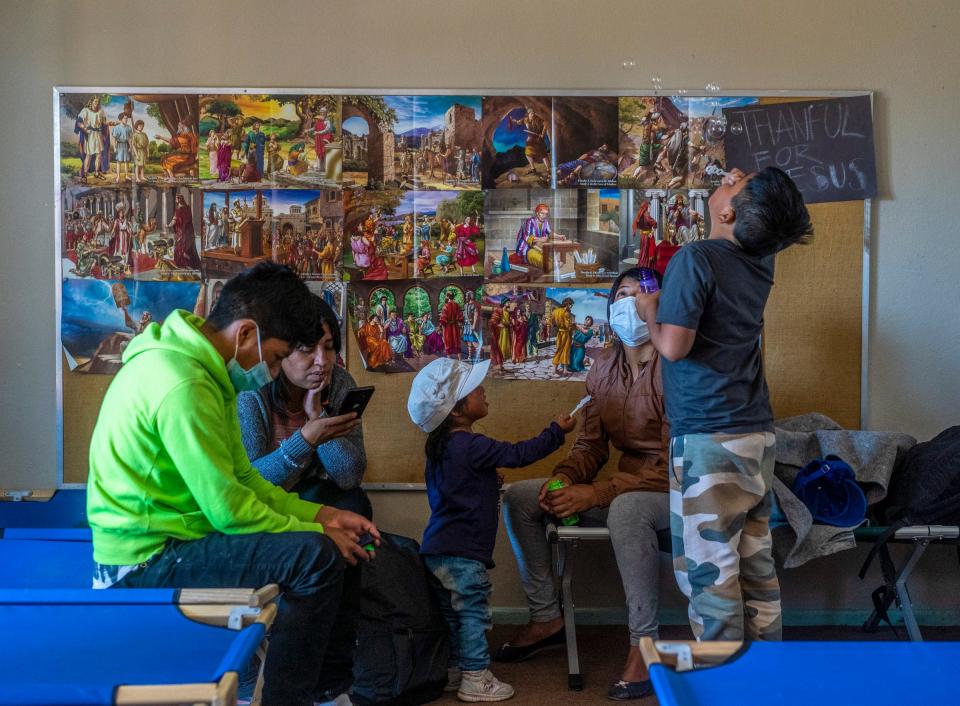 An Ecuadorian undocumented migrant family arrives at Phoenix Monte Vista Baptist Church after they were released from ICE custody. Pastor Angel Campos and volunteers help immigrants with food, shelter and then connect them with their families in various U.S. cities.