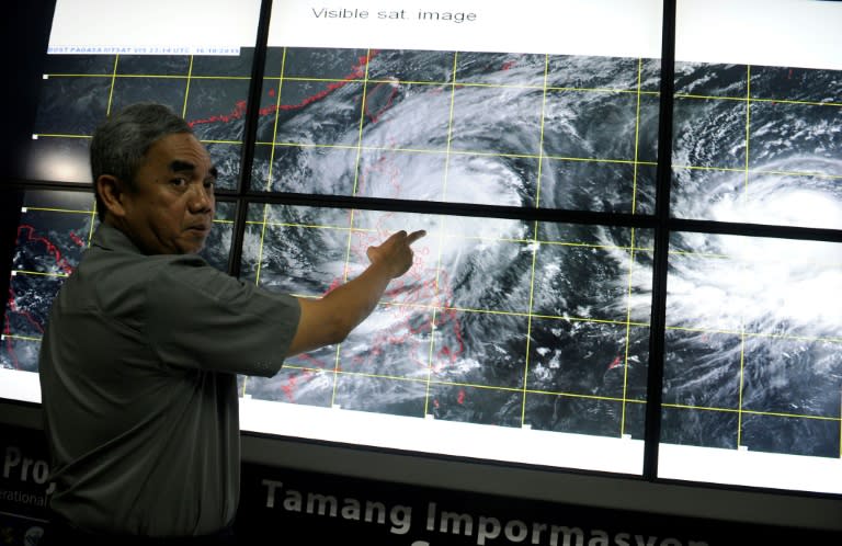 Philippine authorities have warned that a powerful typhoon will likely linger over the country for almost three days, bringing prolonged heavy rain, possible floods and sparking storm surges