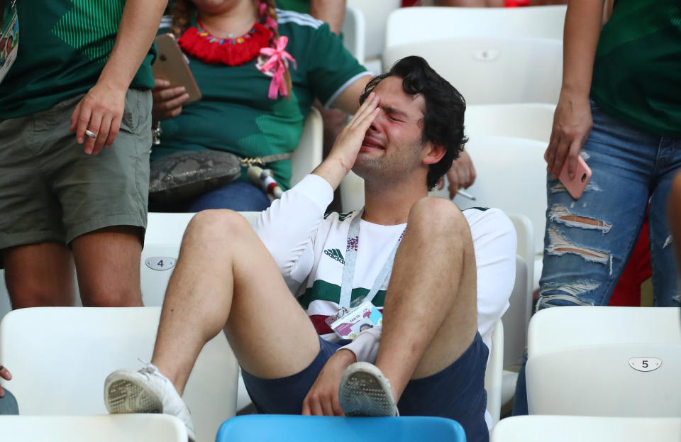 <p>Mexico fan looks dejected after the match REUTERS/Pilar Olivares </p>