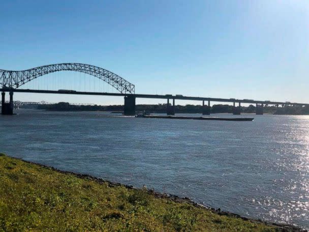 PHOTO: A barge moves north on the Mississippi River under the Interstate 40 bridge connecting Tennessee and Arkansas on Sept. 29, 2022, in Memphis, Tenn. (Adrian Sainz/AP)