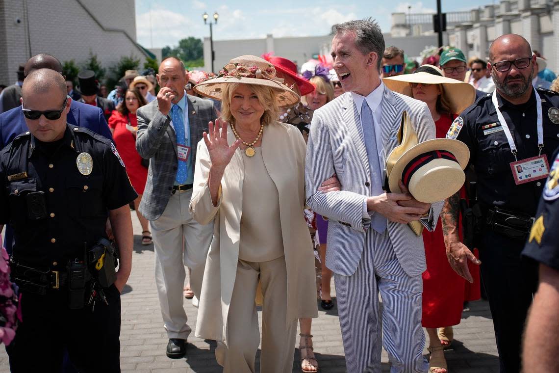 Martha Stewart is escorted through the crowds at Churchill Downs on the day of the 150th running of the Kentucky Derby, in Louisville, Kentucky, on May 4, 2024. (Bryan Woolston)