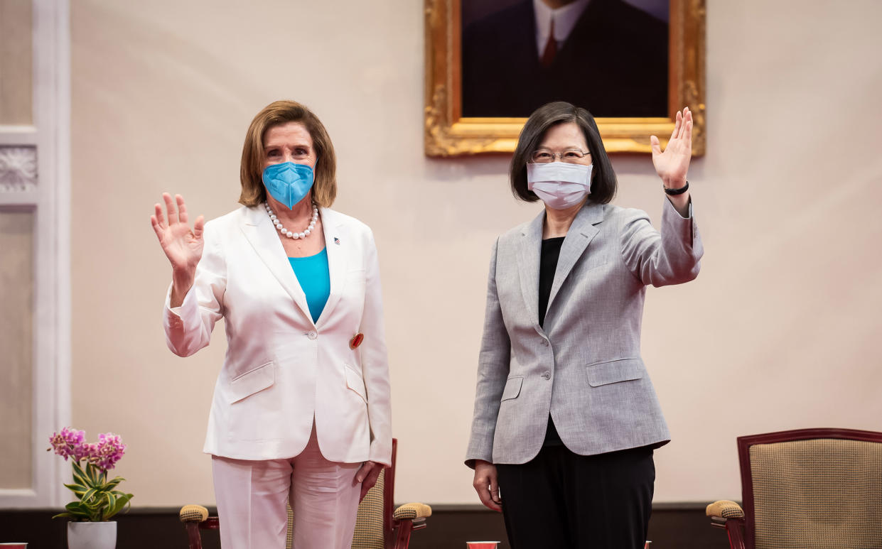 TAIPEI, TAIWAN - AUGUST 03: Speaker of the U.S. House Of Representatives Nancy Pelosi (D-CA), left, poses for photographs with Taiwan's President Tsai Ing-wen, right, at the president's office on August 03, 2022 in Taipei, Taiwan. Pelosi arrived in Taiwan on Tuesday as part of a tour of Asia aimed at reassuring allies in the region, as China made it clear that her visit to Taiwan would be seen in a negative light. (Photo by Handout/Getty Images)