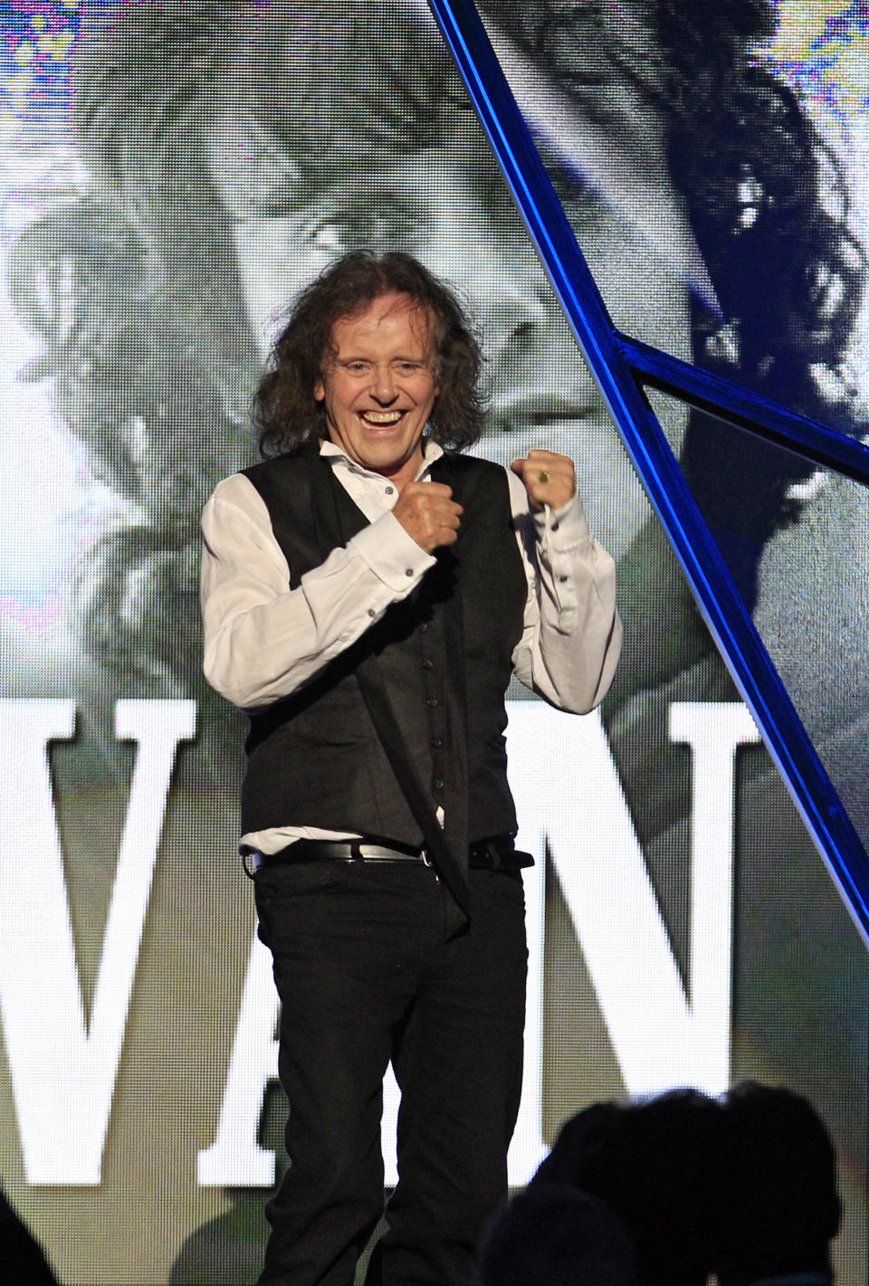 Donovan Leitch reacts after his induction into the Rock and Roll Hall of Fame Saturday, April 14, 2012, in Cleveland. (AP Photo/Tony Dejak)