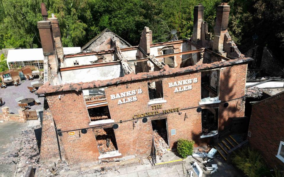 The pub was demolished two days after a huge blaze that is being investigated by police