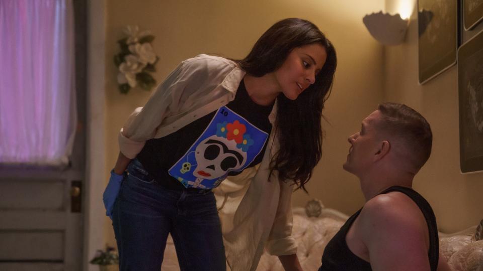 Carmela Zumbado as Mireya Garcia and Joseph Sikora as Tommy talking in Power Book IV: Force season 2