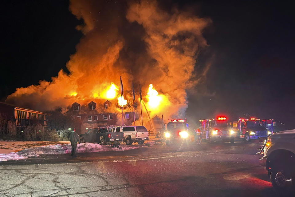 Firefighters battle an overnight blaze that destroyed the Lutsen Lodge on the North Shore of Lake Superior, early Tuesday, Feb. 6, 2024, in Lutsen, Minn. (Edward Vanegas via AP)