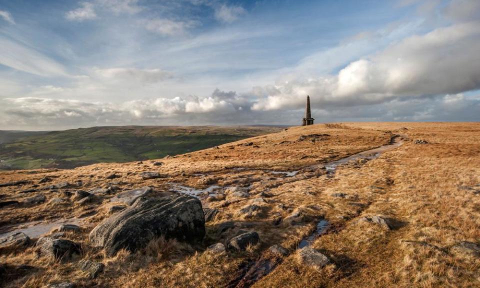 Stoodley Pike monument on brown moorland