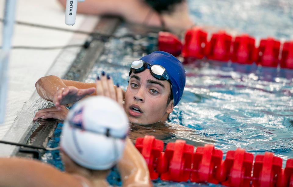 Nicole Shanks of Vanguard after winning the 200 IM during the MCIAC swimming championships at FAST.