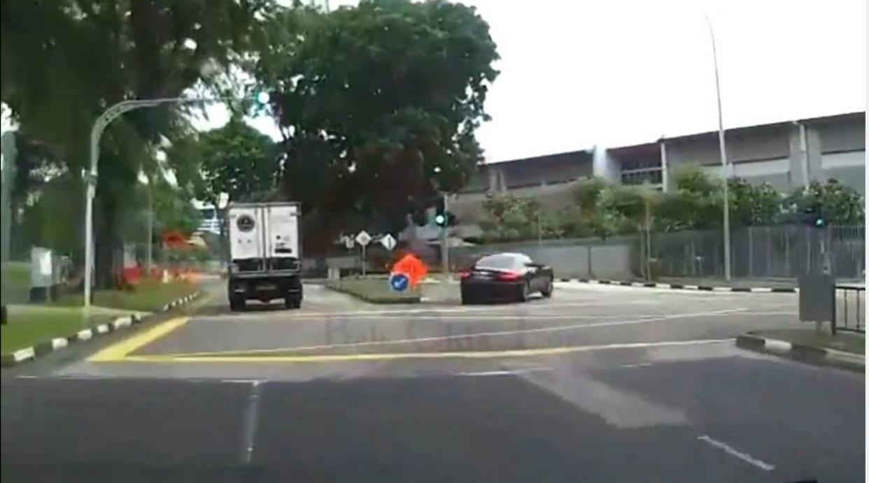 The video, uploaded on September 11 2018, shows a Maserati driving against traffic in order to overtake a lorry. Screenshot from Beh Chia Lor – Singapore Road Facebook page.