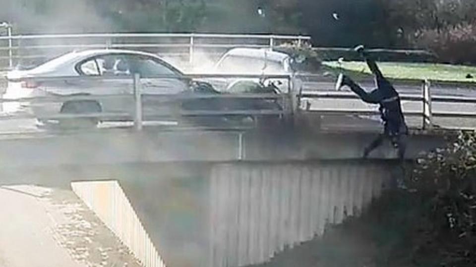 Extreme Road Rage Driver Catapults Motorcyclist Off Bridge