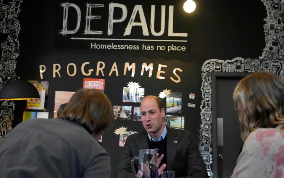 The Prince of Wales meets clients during a visit to Depaul, a youth homelessness charity, to highlight the work they are doing to help young people on January 19 - Kirsty Wigglesworth/POOL/AFP