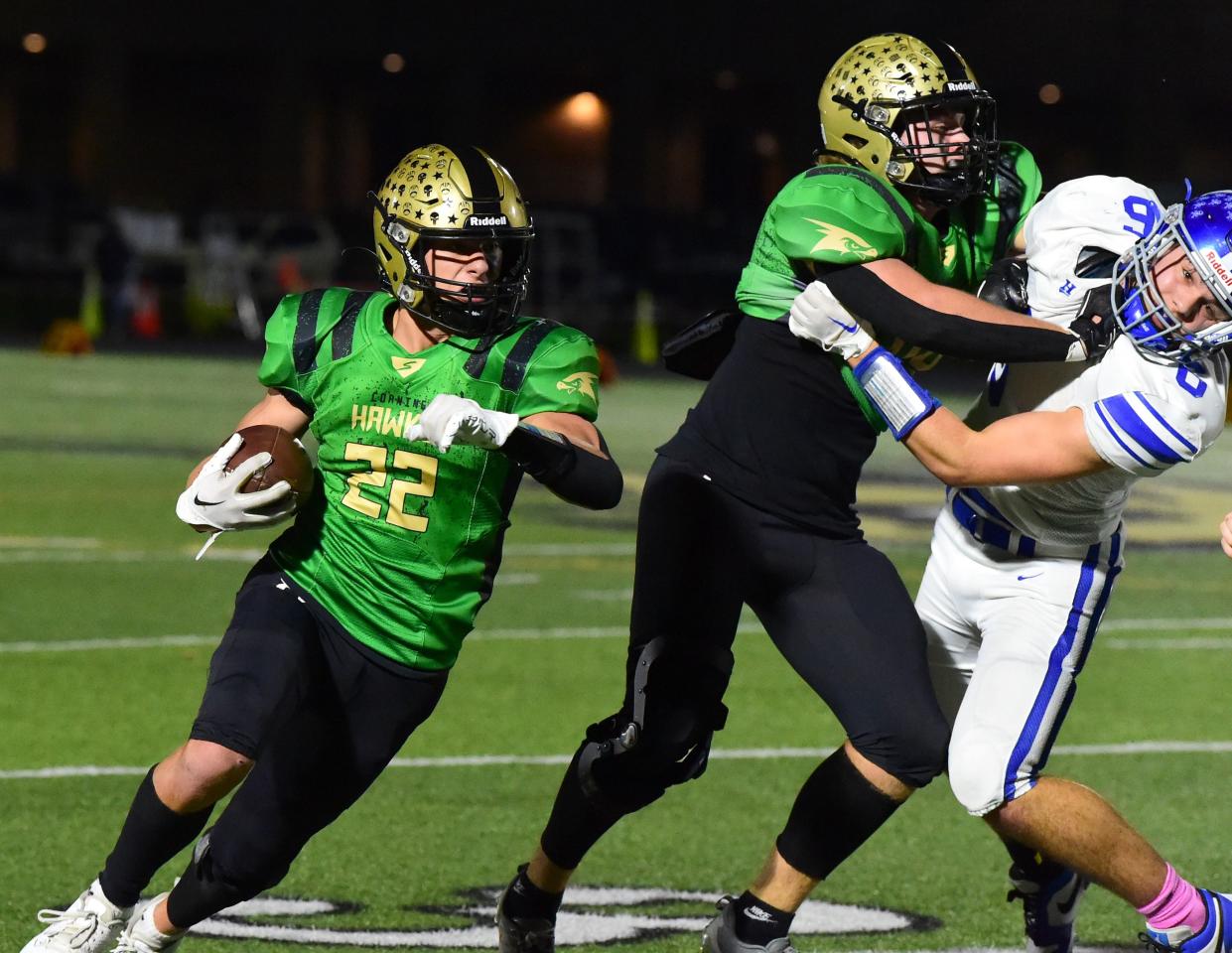 Corning's James Freeman runs behind the blocking of fullback AJ Thomas during a 29-20 win over Horseheads in football Oct. 27, 2023 at Corning Memorial Stadium.