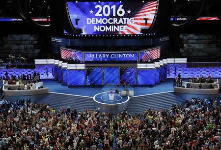 Delegates cheer at the annoucement that Hillary Clinton is named the Democratic Party nominee for president at the Democratic National Convention in Philadelphia, Pennsylvania, U.S., July 26, 2016. REUTERS/Rick Wilking