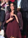 <p>Meghan Markle elegantly 'shrobed' (shoulder robed) her berry leather jacket to cover her shoulders at the 2017 Invictus games. The actress took a leaf out of Kate Middleton's book and went for a colour-blocking look all the way down to her accessories.</p>