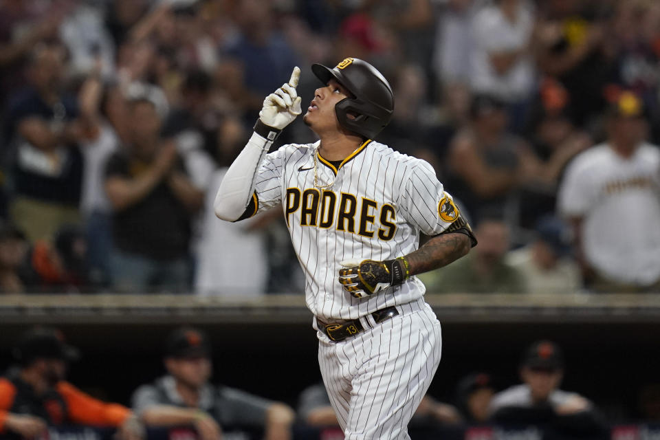 San Diego Padres' Manny Machado reacts after hitting a home run during the fourth inning of a baseball game against the San Francisco Giants, Thursday, July 7, 2022, in San Diego. (AP Photo/Gregory Bull)
