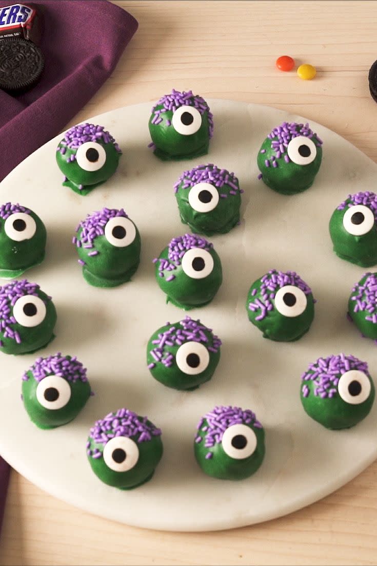 <p>These scary cute no-bake monsters are essentially <a href="https://www.delish.com/cooking/recipe-ideas/recipes/a48823/oreo-truffles-recipe/" rel="nofollow noopener" target="_blank" data-ylk="slk:Oreo Truffles" class="link ">Oreo Truffles</a> all dressed up for Halloween.</p><p>Get the recipe from <a href="https://www.delish.com/holiday-recipes/halloween/a34535034/monster-truffles-recipe/" rel="nofollow noopener" target="_blank" data-ylk="slk:Delish" class="link ">Delish</a>.</p>