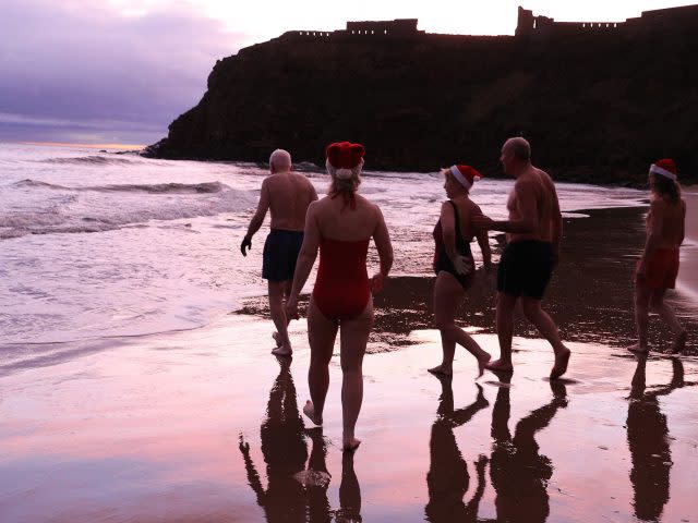 Swimmers take the plunge at King Edward's Bay, Newcastle