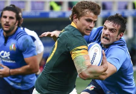 Rugby Union - Rugby Test - Italy v South Africa - Artemio Franchi stadium, Florence, Italy - 19/11/16. Italy's Tommaso Benvenuti in action against South Africa's Pat Lambie. REUTERS/Alessandro Bianchi