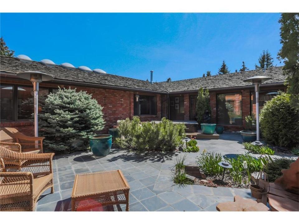 <p>When you’re not soaking up the sunshine on the deck, you can play tennis in the on-site court, or stroll the landscaped grounds. (Realtor.ca) </p>