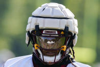 Washington Commanders running back Jonathan Williams wears a Guardian Cap football helmet during practice at the team's NFL football training facility, Wednesday, July 27, 2022 in Ashburn, Va. (AP Photo/Alex Brandon)