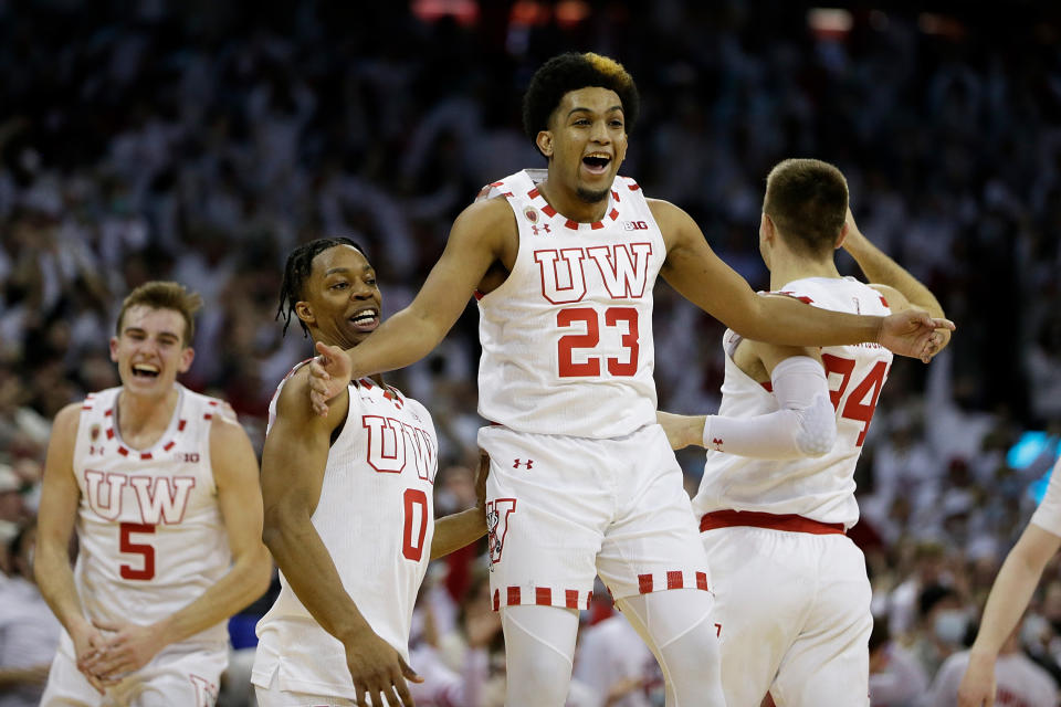 Chucky Hepburn #23 of the Wisconsin Badgers celebrates after hitting the game-winning shot in the final seconds of the game against the Purdue Boilermakers at Kohl Center on March 01, 2022 in Madison, Wisconsin. (Photo by John Fisher/Getty Images)