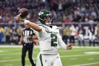 New York Jets quarterback Zach Wilson (2) passes in the first half of an NFL football game against the Houston Texans in Houston, Sunday, Nov. 28, 2021. (AP Photo/Justin Rex)