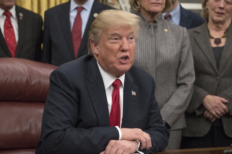 President Donald Trump speaks before signing a bipartisan bill to stop the flow of opioids into the United States in the Oval Office of the White House in Washington, D.C., on January 10, 2018. On August 10, 2017, he declared the opioid crisis a national emergency. File Photo by Ron Sachs/UPI